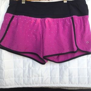 Lululemon 6 Night Reflective Violet speed shorts.